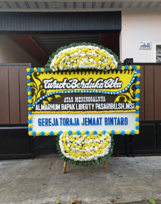 Papan Bunga Duka di Ketang Baru